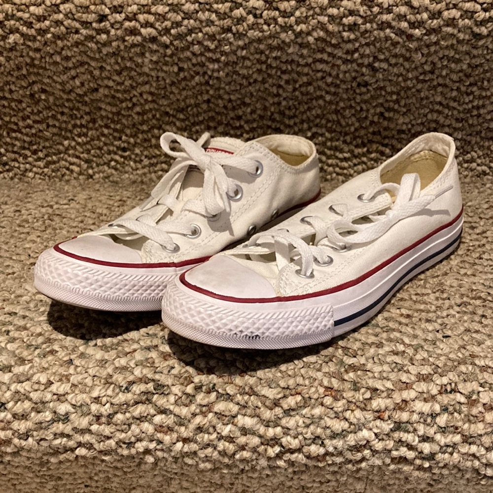 Converse. White. Worn only once. Has miner brown stains on tiptoe.